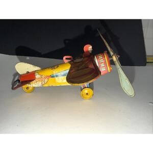 Vtg Unique Art SKY RANGERS Tin Wind Up Toy Airplane . ca 30s